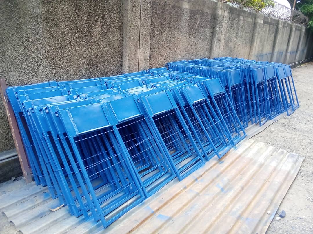 Helderlink — Folding display frames, sprayed and stacked for delivery.