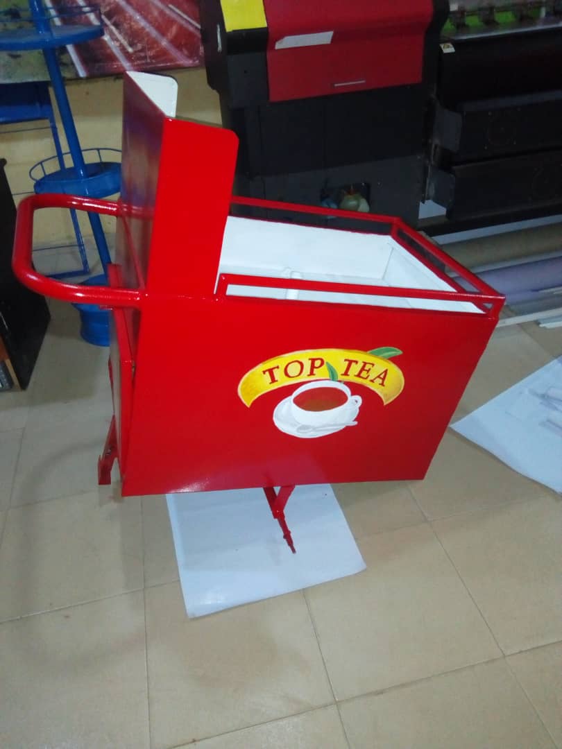 Top Tea — The finished vending cart, sprayed and branded.