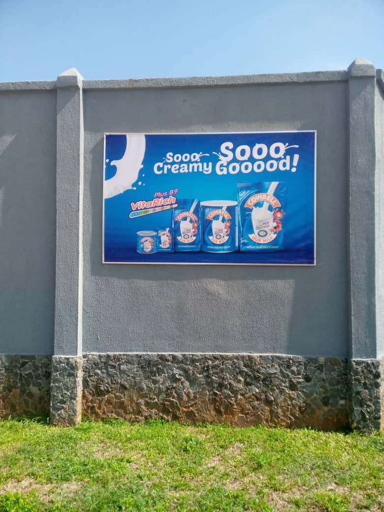 Cowbell — "Sooo Creamy" panel mounted on a perimeter wall.