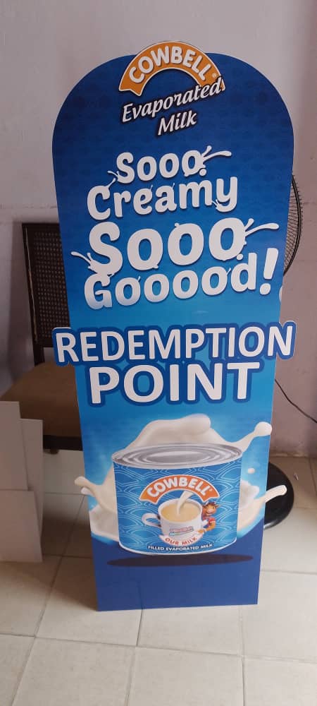 Cowbell — "Redemption Point" die-cut floor standee.